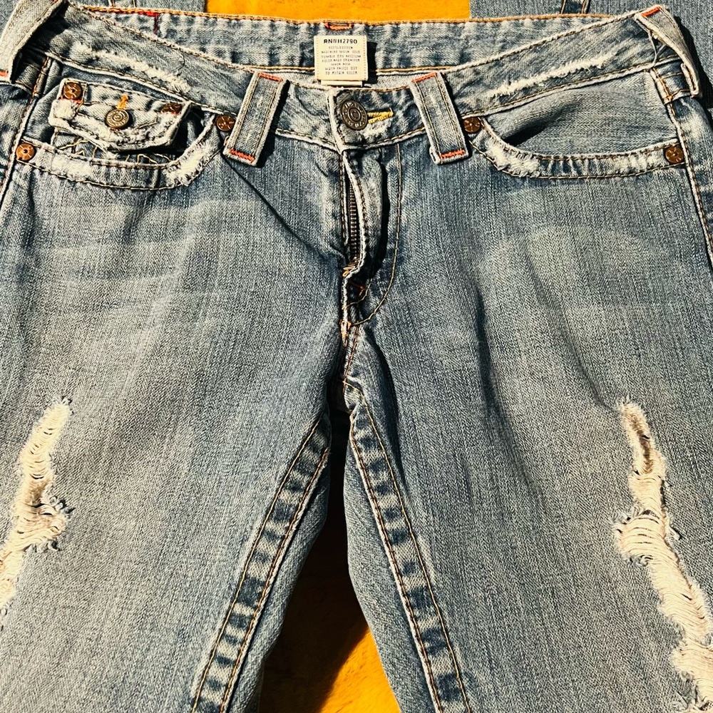 TRUE RELIGION BOOTCUT SLASHED JEANS